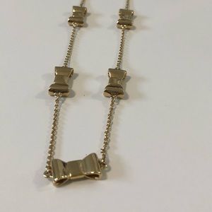 Long Kate Spade bow necklace